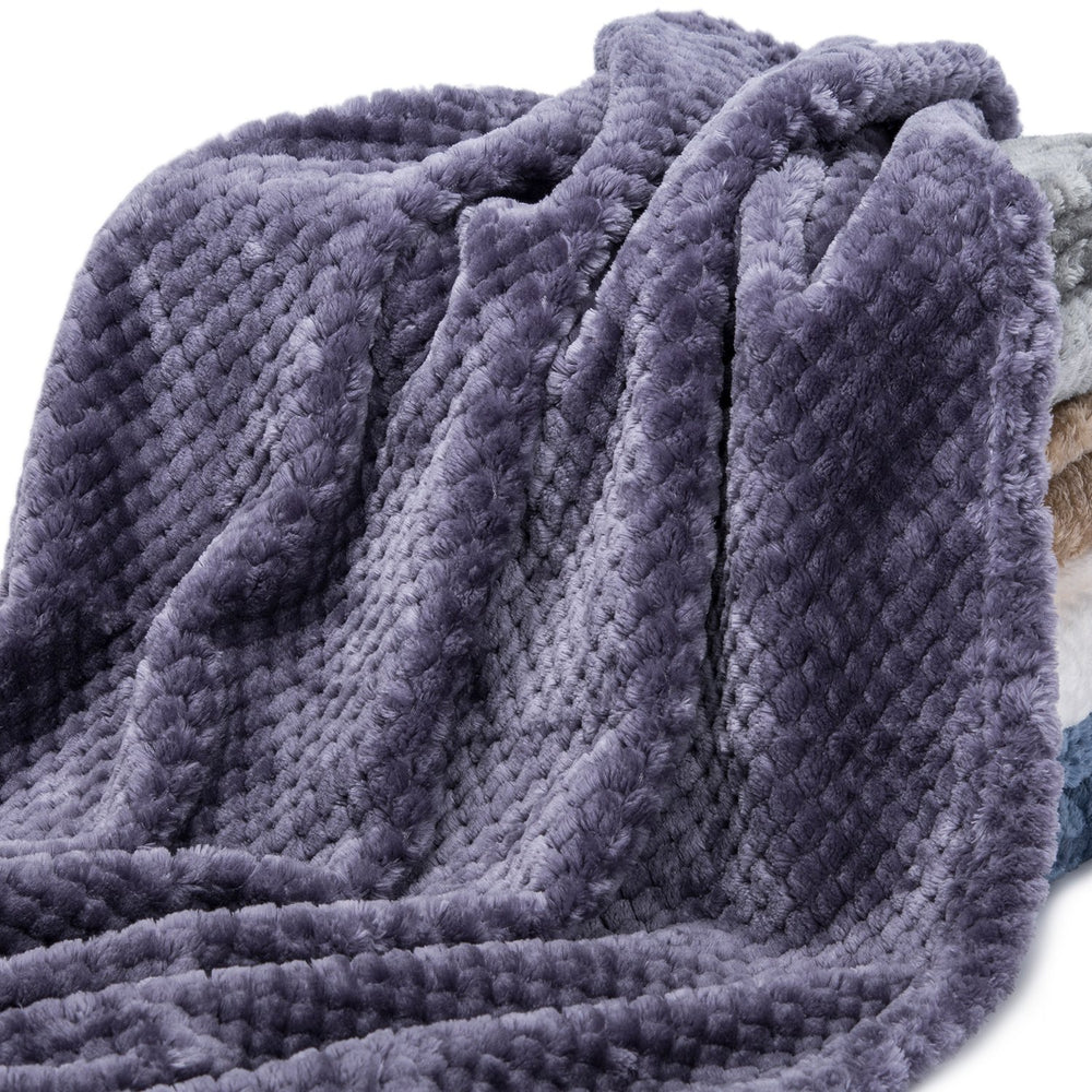 WONDER MIRACLE fuzzy blanket rolled for travel, compact and portable