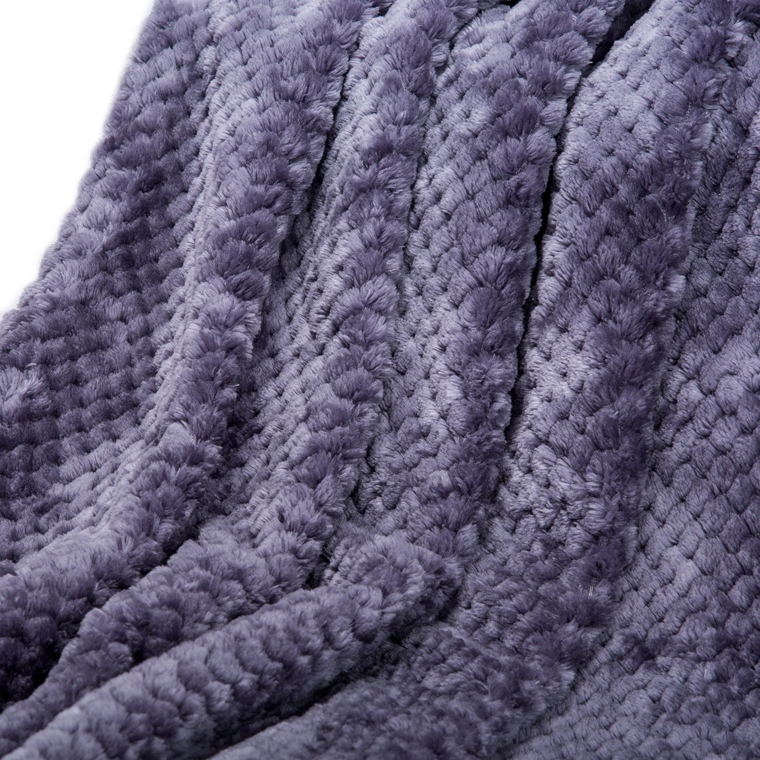 WONDER MIRACLE fuzzy blanket draped over crib rail, decorative and soft