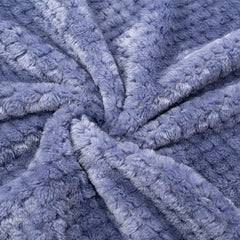 Wonder Miracle fuzzy blanket folded for travel and easy packing