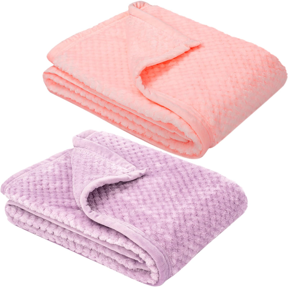 Wonder Miracle fuzzy blanket in pink and lavender with plush texture for soothing snuggles.