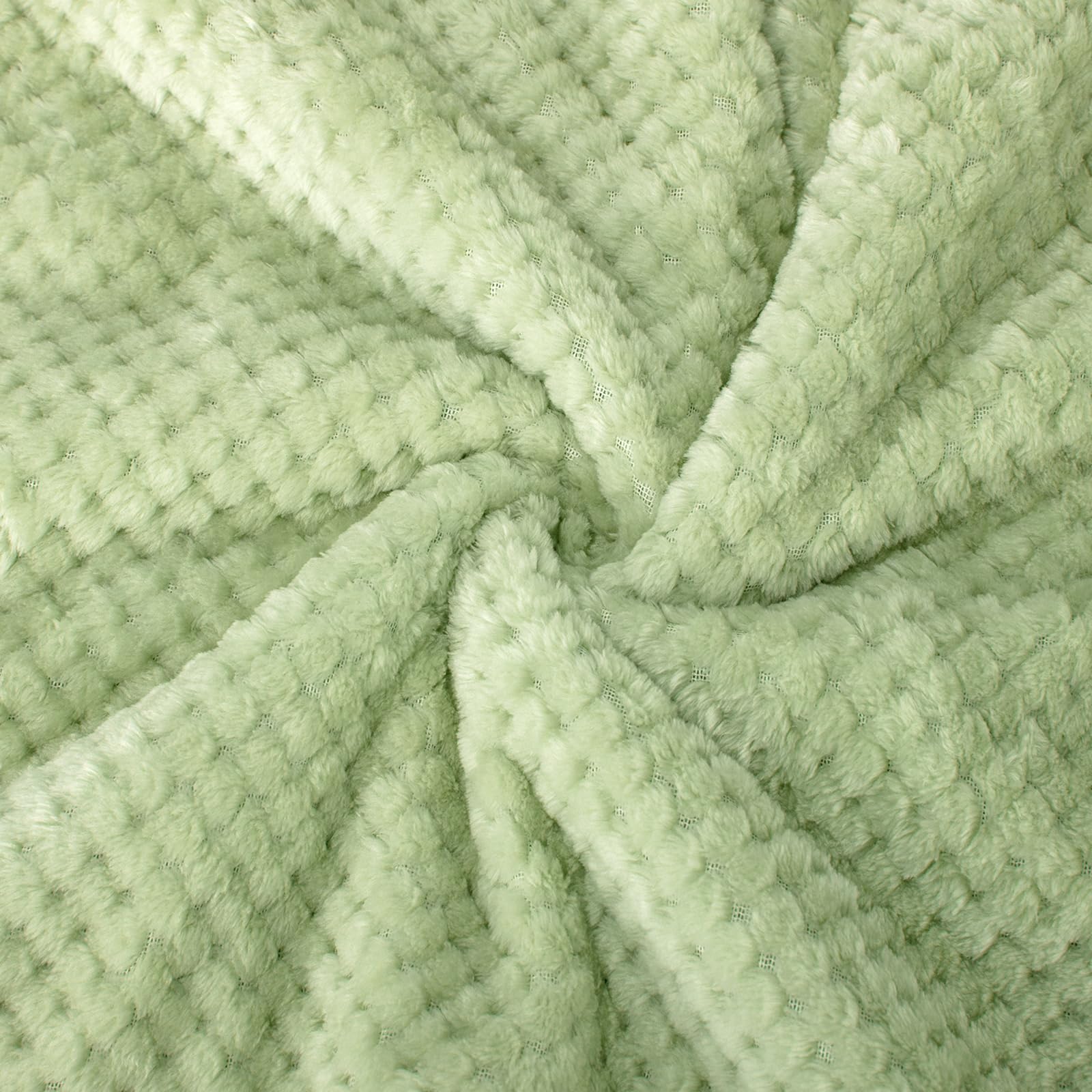 All-season Wonder Miracle blanket shown in a bed for year-round coziness.