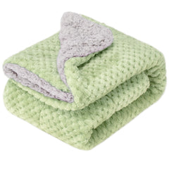 Wonder Miracle fuzzy sherpa blanket on a sleeping baby for cozy warmth.