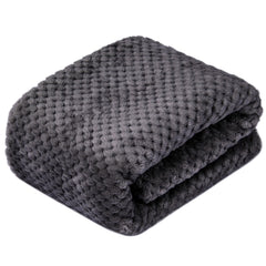 Close-up of Wonder Miracle fuzzy sherpa texture highlights plush softness and durability.