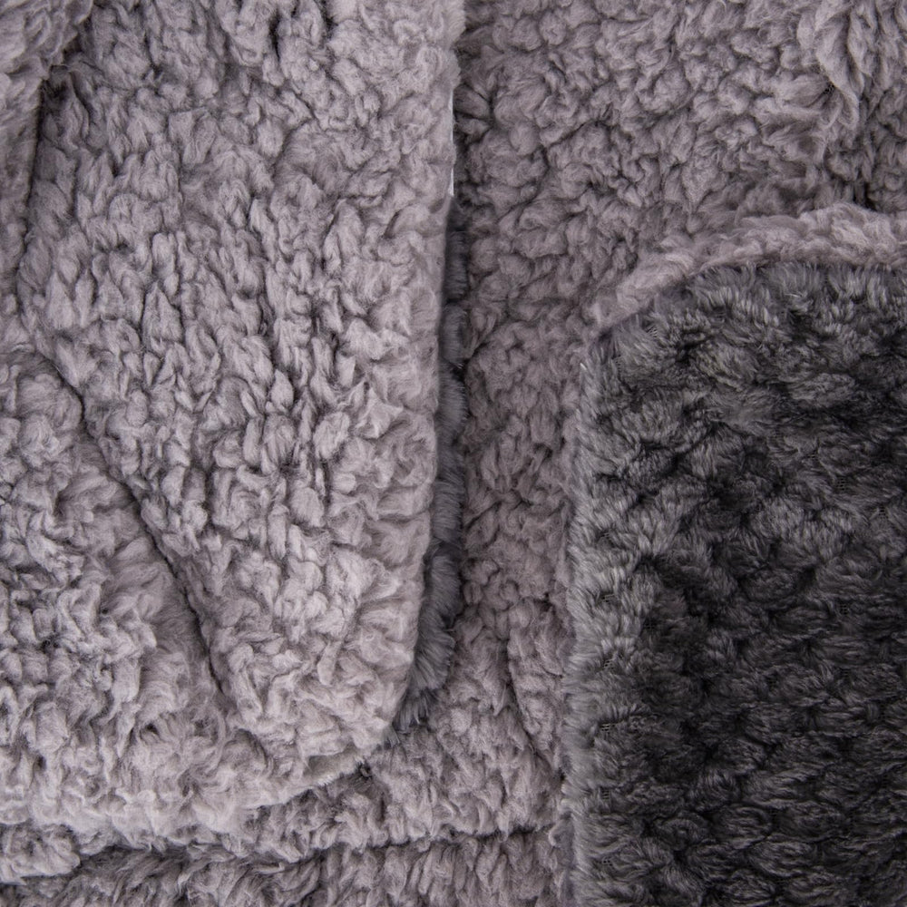 Wonder Miracle reversible blanket shows two cozy sides for year-round use.
