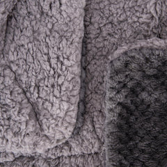 Wonder Miracle reversible blanket shows two cozy sides for year-round use.