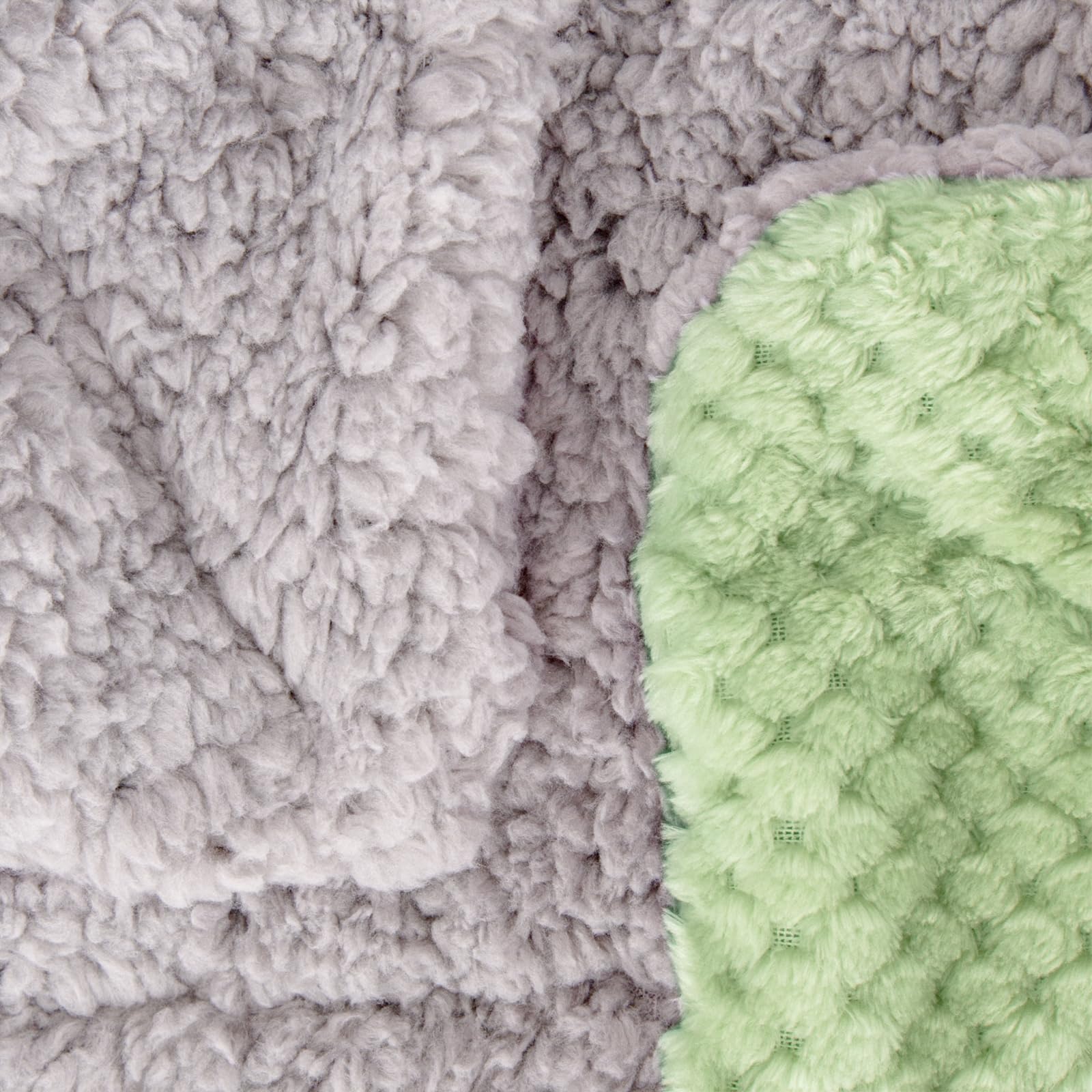 Wonder Miracle fuzzy sherpa blanket in stroller to protect baby from drafts.