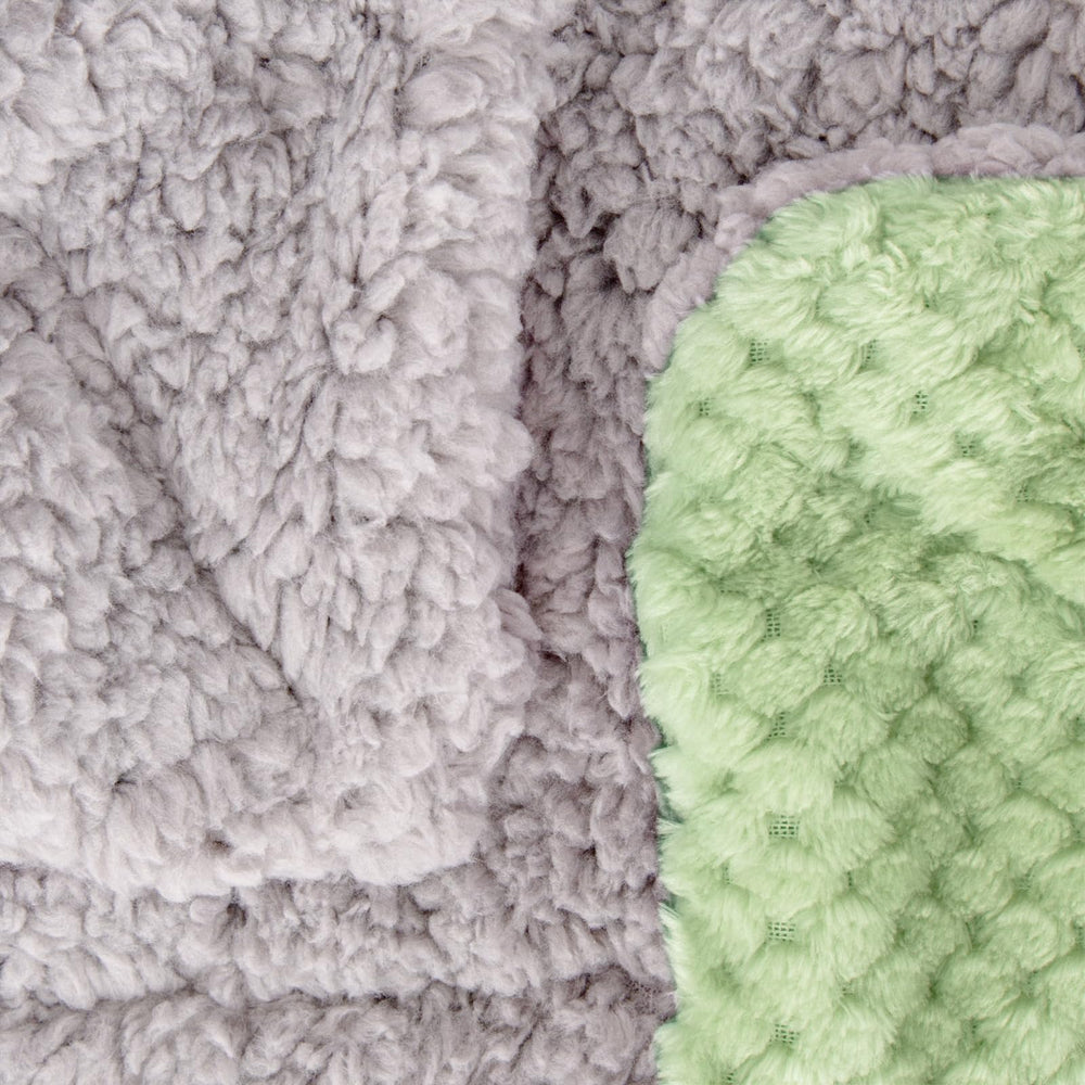 Wonder Miracle fuzzy sherpa blanket in stroller to protect baby from drafts.