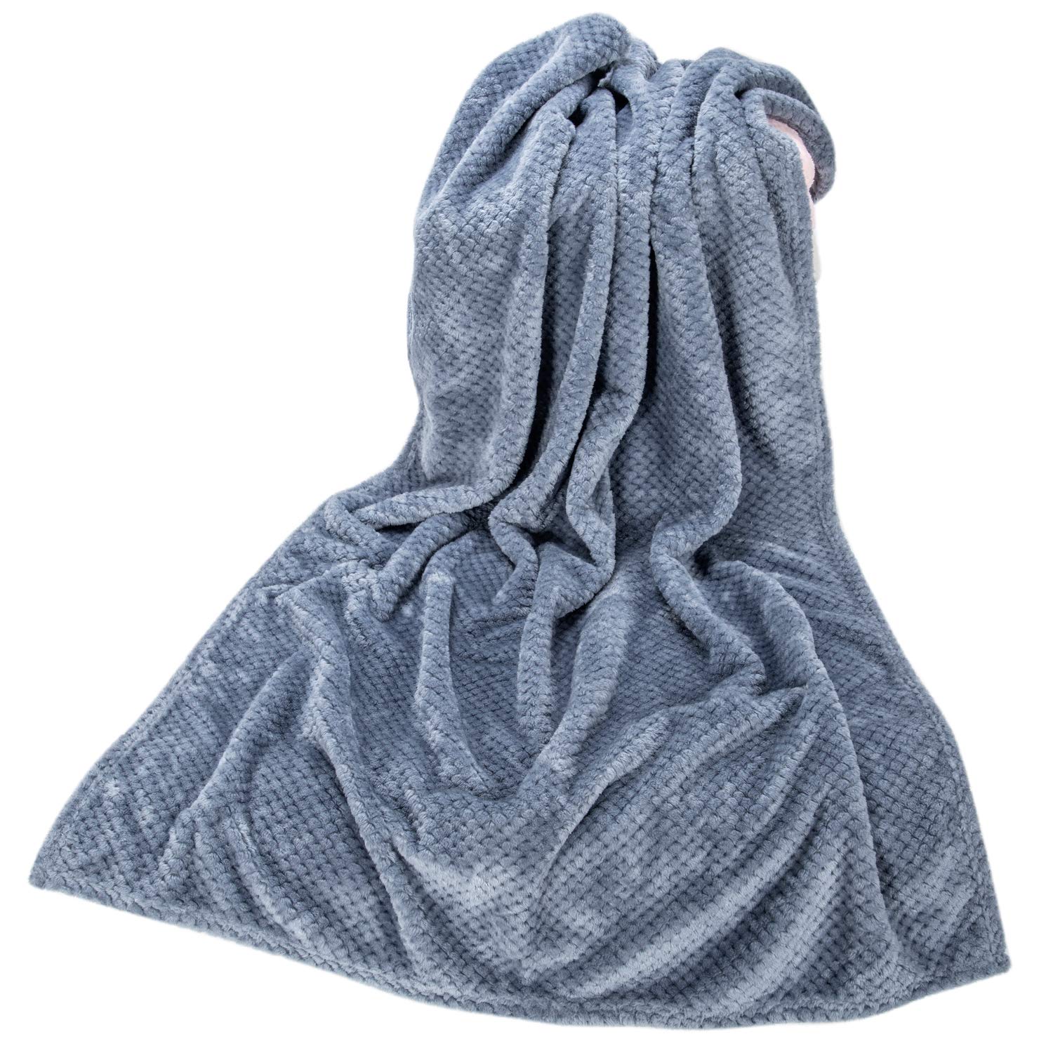 Wonder Miracle fuzzy throw blanket shown as a baby swaddle for calm routine use.