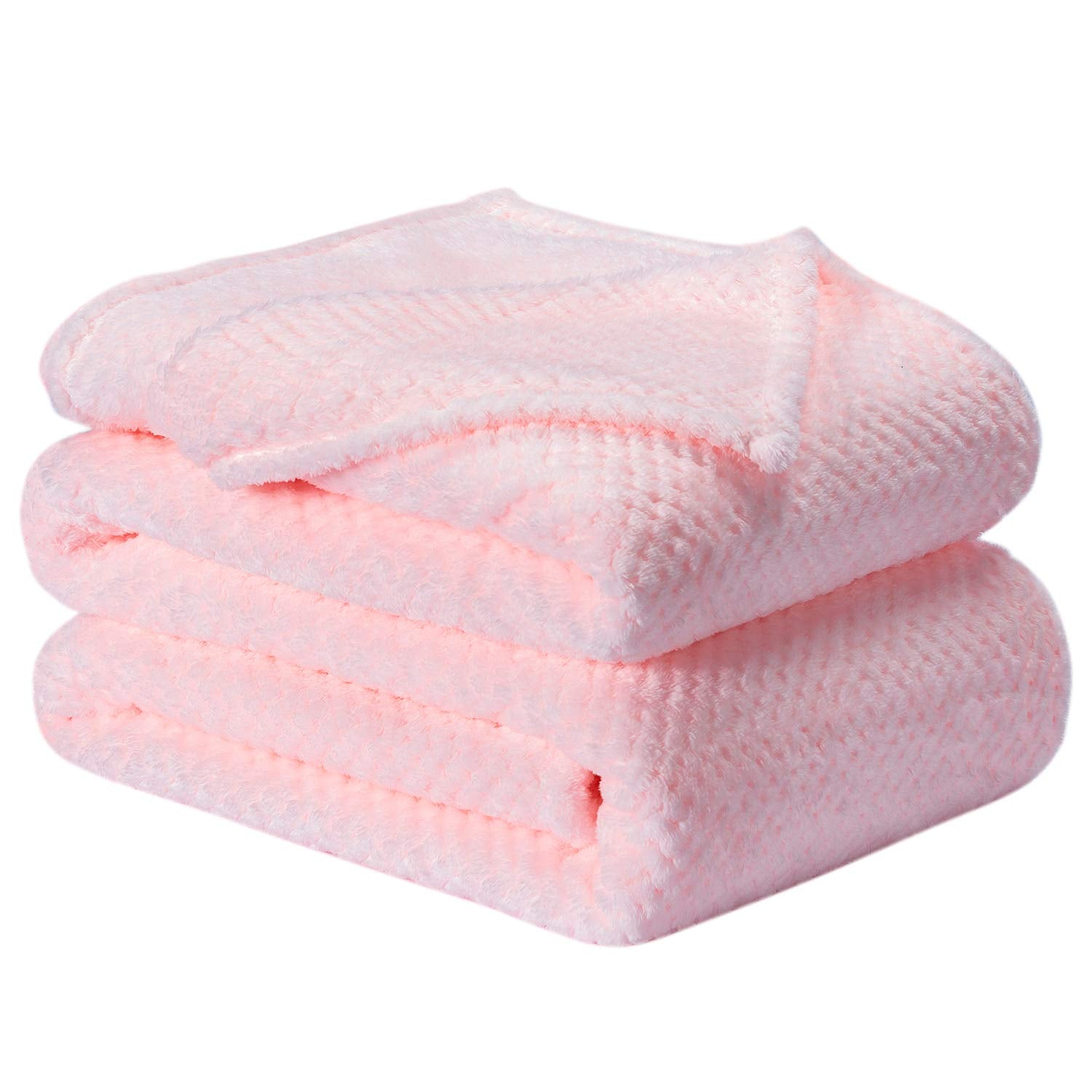 Wonder Miracle fuzzy throw blanket on bed for cozy warmth