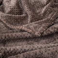Wonder Miracle fuzzy throw blanket with a child snuggling warmly.