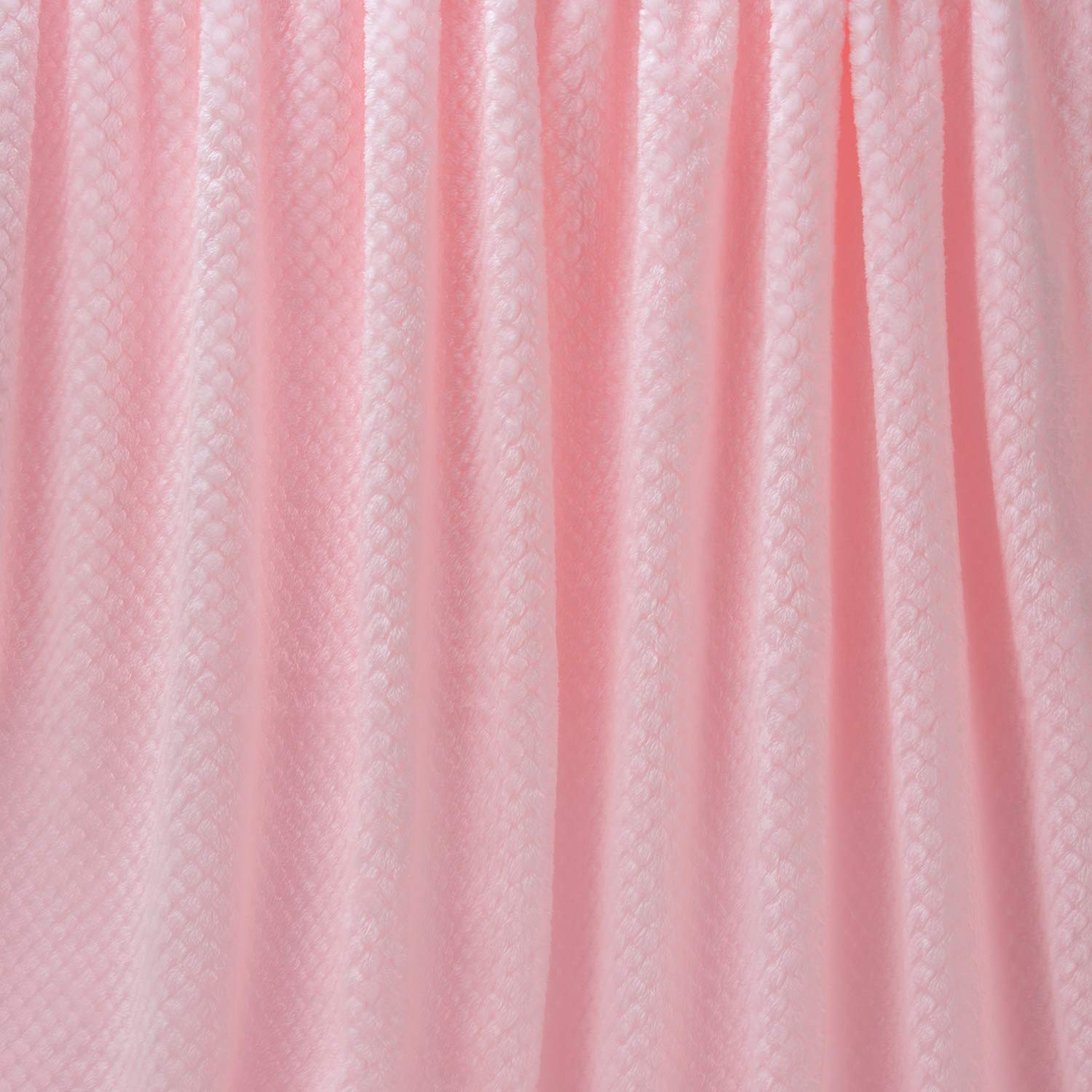 Wonder Miracle baby-pink throw highlights safe materials for sensitive skin and family use.