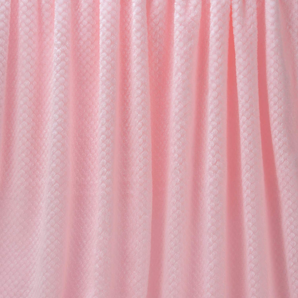 Wonder Miracle baby-pink throw highlights safe materials for sensitive skin and family use.