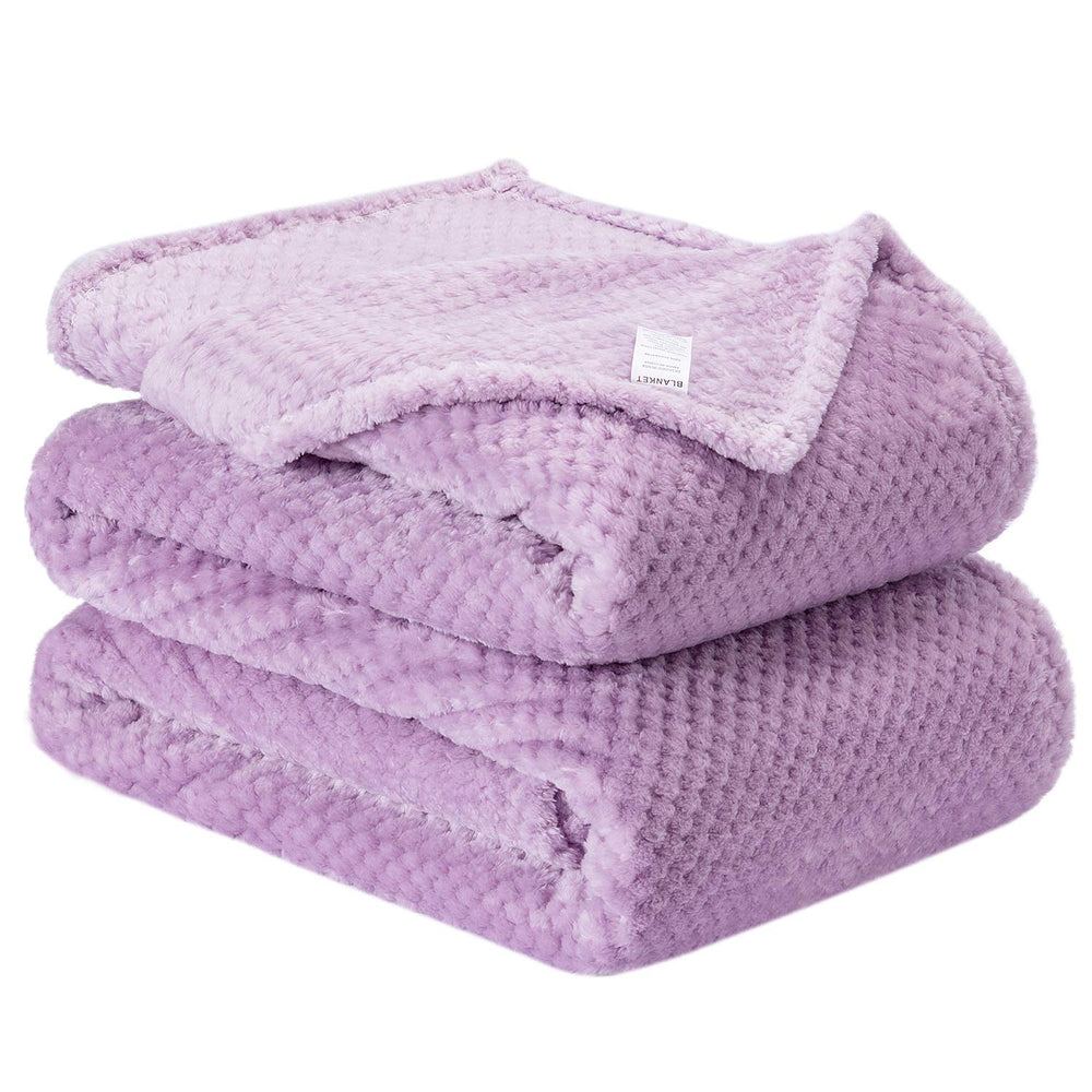 Wonder Miracle fuzzy throw blanket in soft fleece offers cozy warmth for bed.
