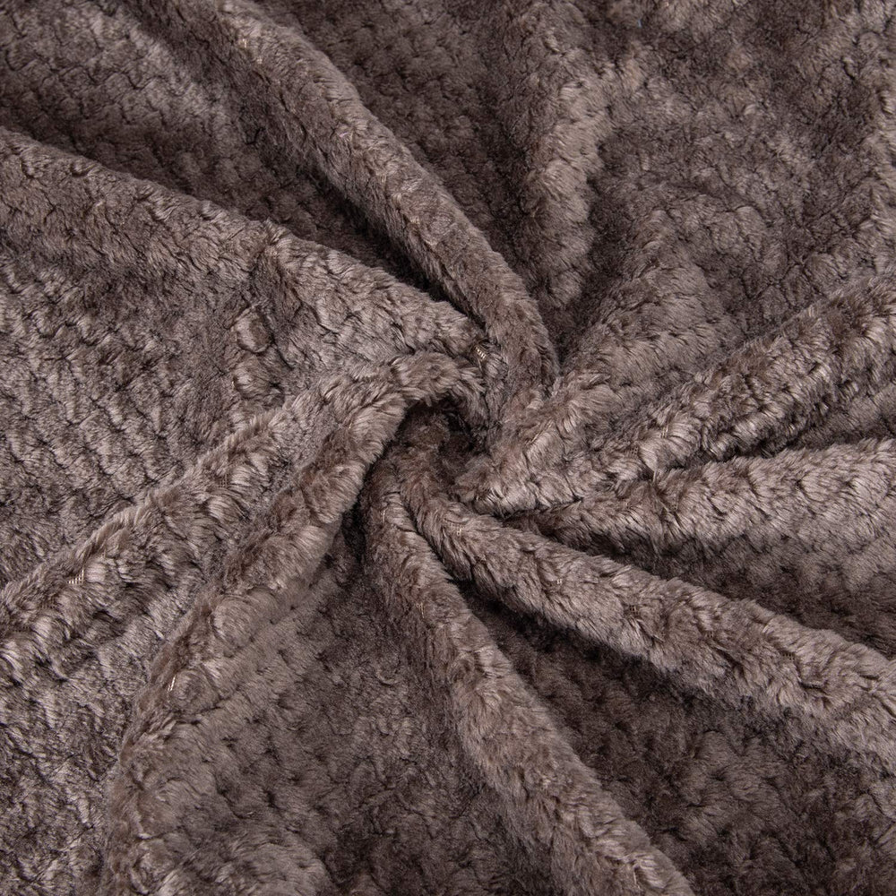 Wonder Miracle fuzzy throw blanket close-up shows soft micro fleece texture.