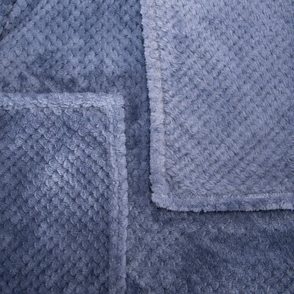 Wonder Miracle Fuzzy Throw Blanket travel packable for on-the-go comfort.