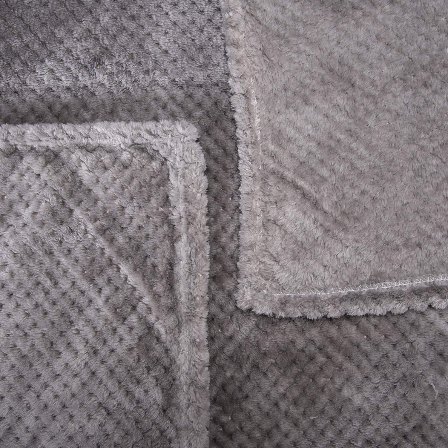 Wonder Miracle fuzzy throw blanket packed for travel and outdoor use