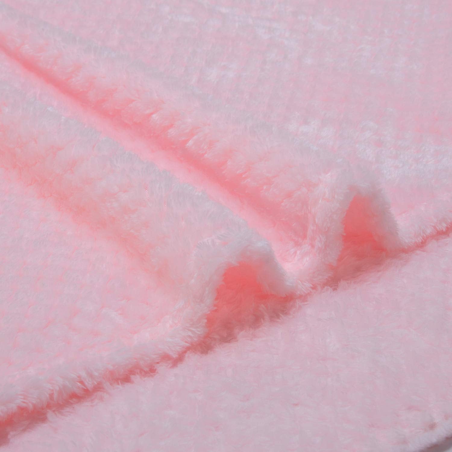 Wonder Miracle fuzzy throw blanket packed for travel, ready for car rides and on-the-go warmth.