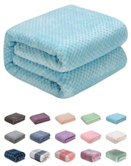 Wonder Miracle fuzzy throw blanket offers cozy warmth for couch and bed.