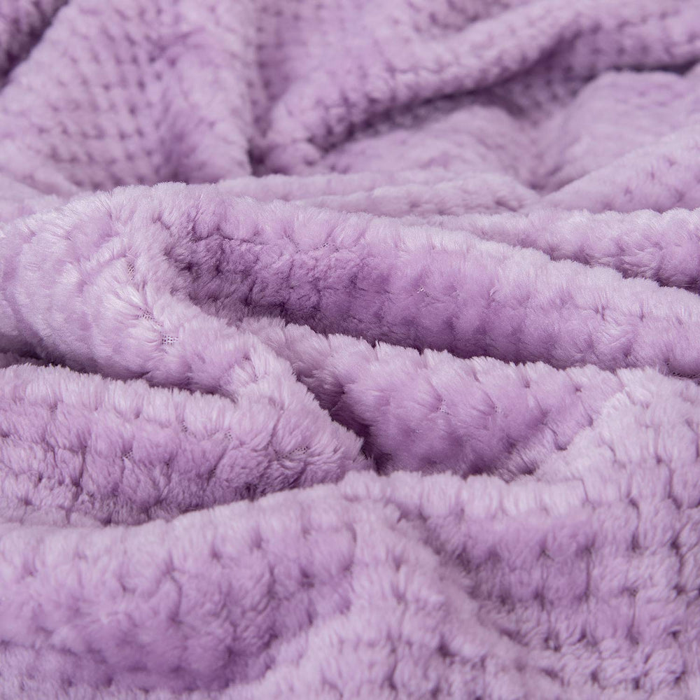 Wonder Miracle outdoor blanket in lavender ideal for camping and picnics.