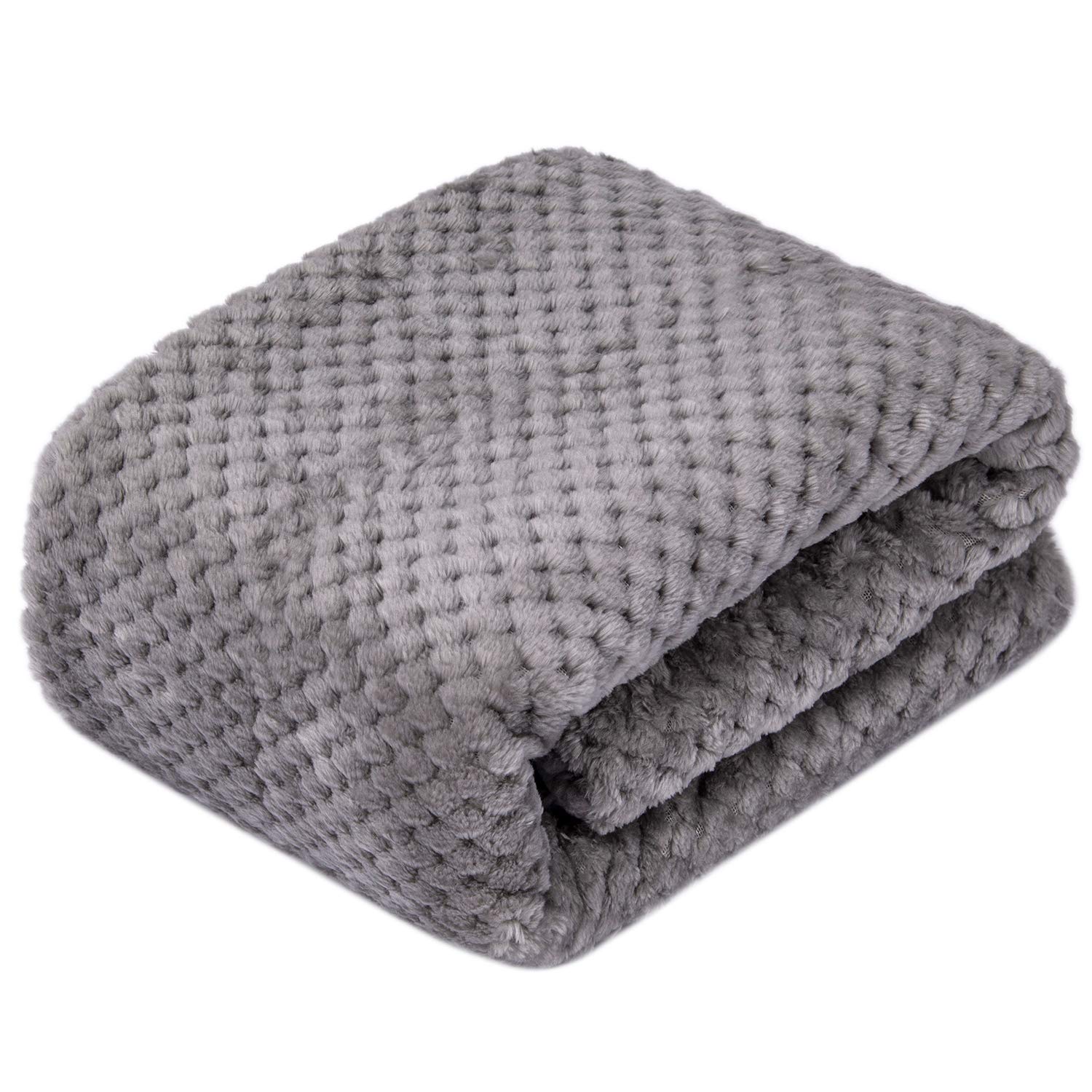 Wonder Miracle plush fleece blanket on a dog bed for warmth and comfort.