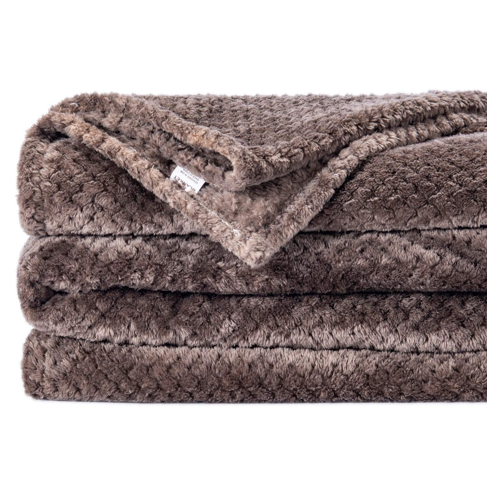 Wonder Miracle plush fleece-knit blanket delivering soft warmth