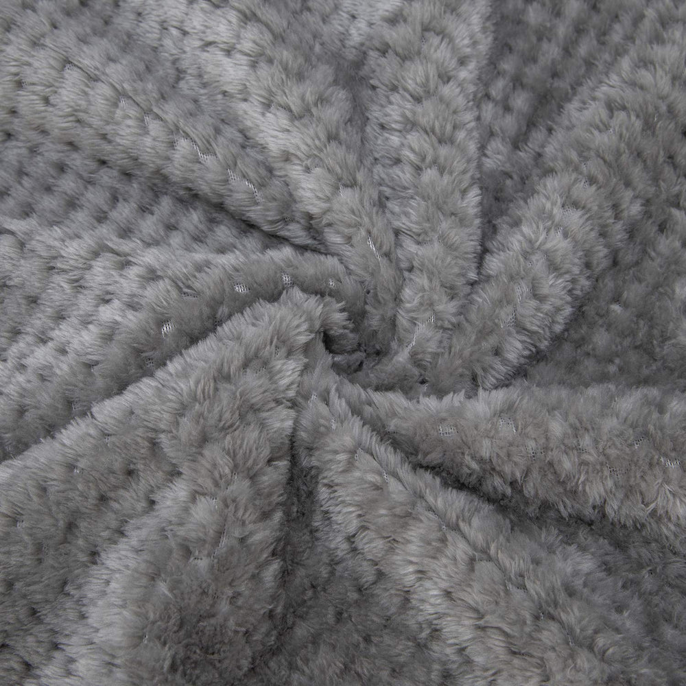 Wonder Miracle microfleece blanket offers gentle, breathable warmth for baby snuggles.