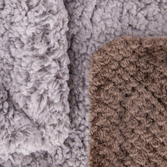Wonder Miracle stroller-cover blanket keeps little one warm on the go.