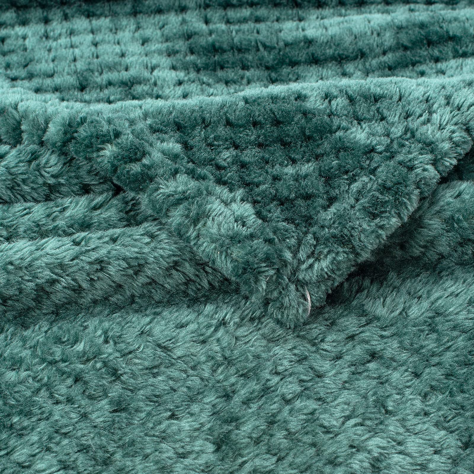 Wonder Miracle travel-friendly blanket folds compactly for on-the-go comfort.