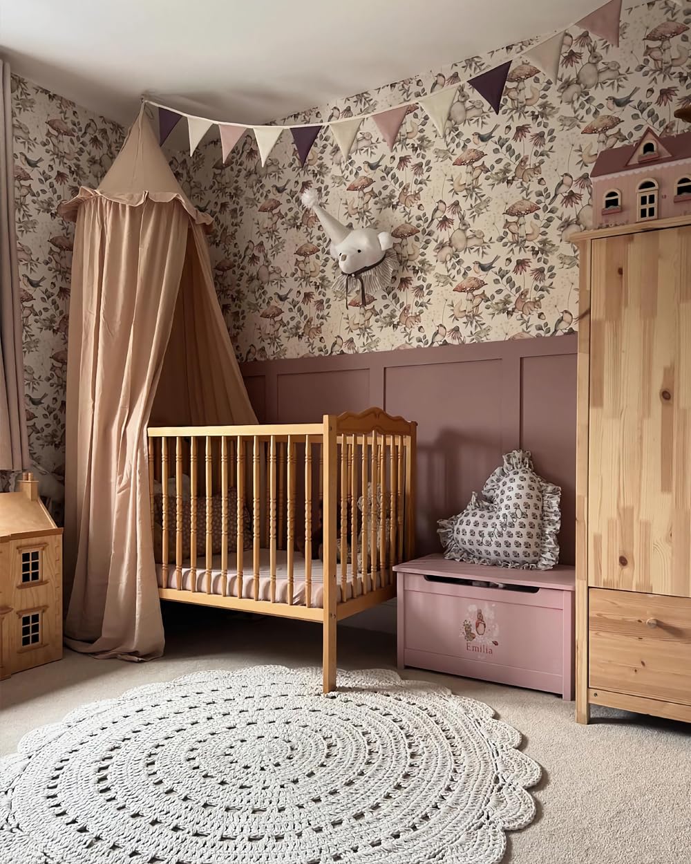 Wonder Space canopy over crib in nursery creating a reading nook