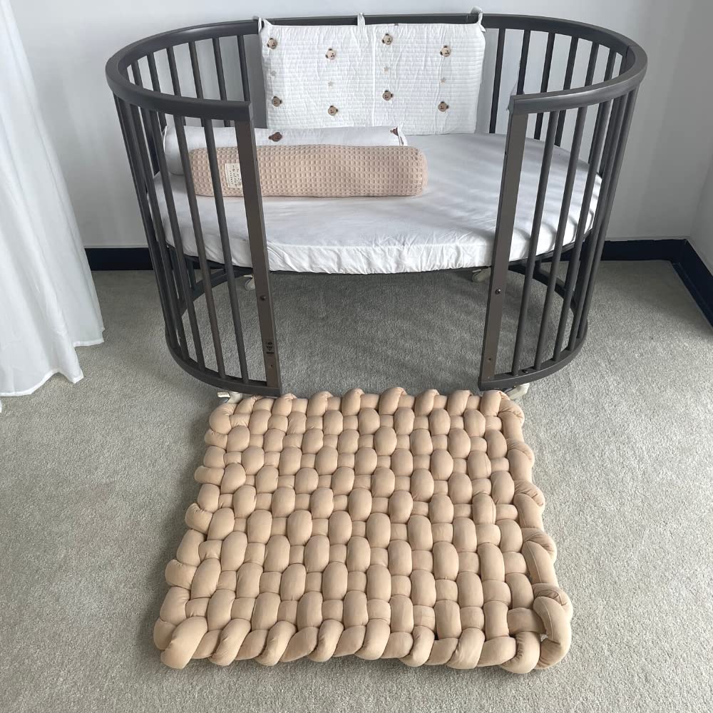 Wonder Space knotted braided plush mat, side view, soft tummy time surface.