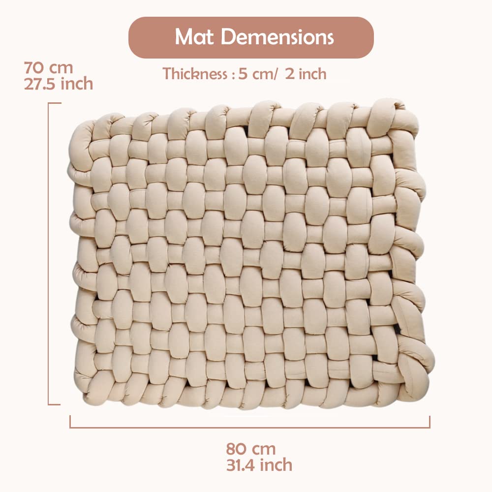 Wonder Space knotted braided plush mat, used for tummy time experiences.
