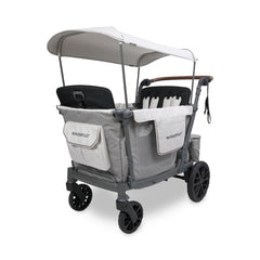 WonderFold Outdoor L4 quad wagon in gray collapsed for compact storage after a family stroll.