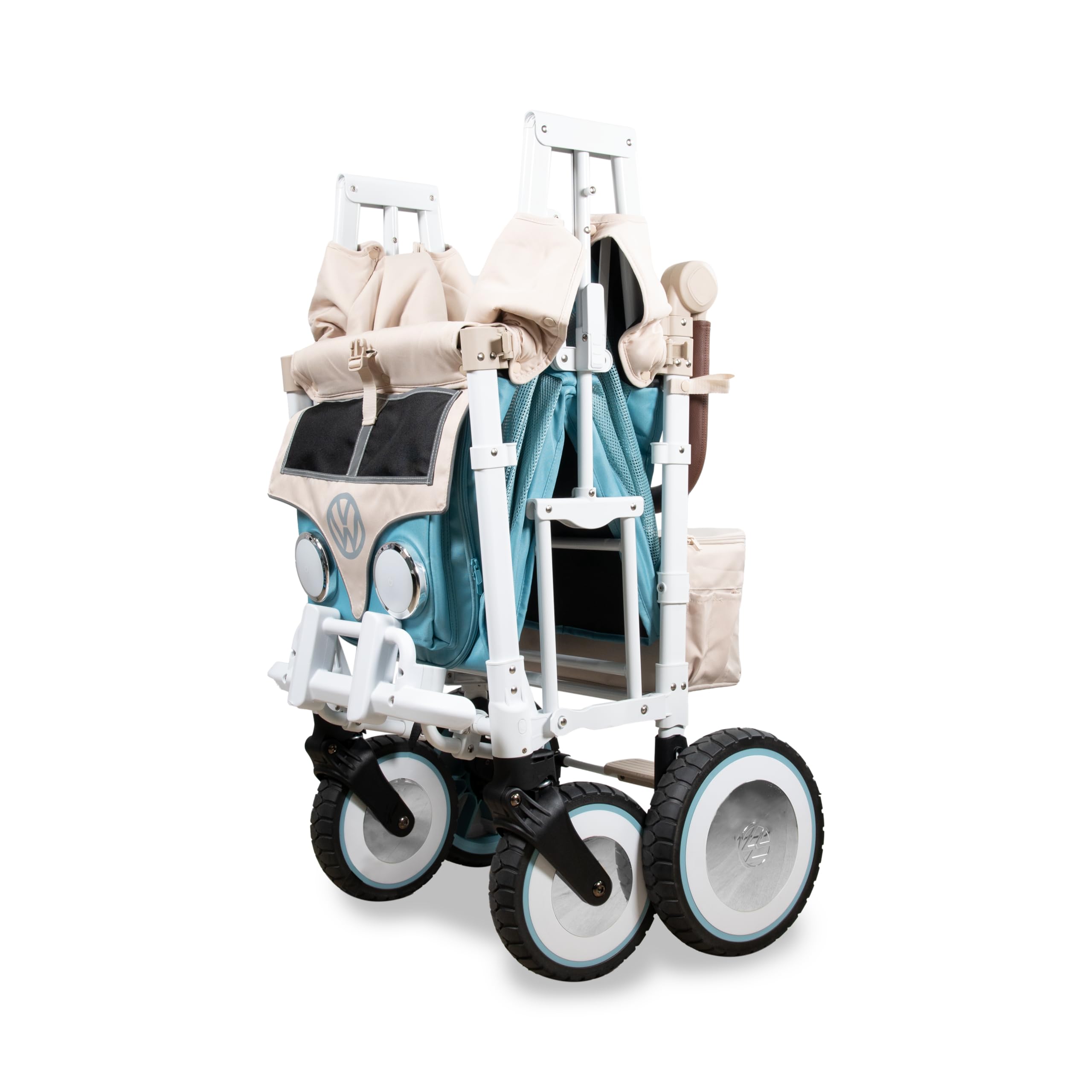 WonderFold VW wagon headlights on, aiding visibility during evening strolls.