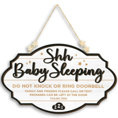 Woodamore Shhh Baby Sleeping Sign on front door with rope hanger for easy display.