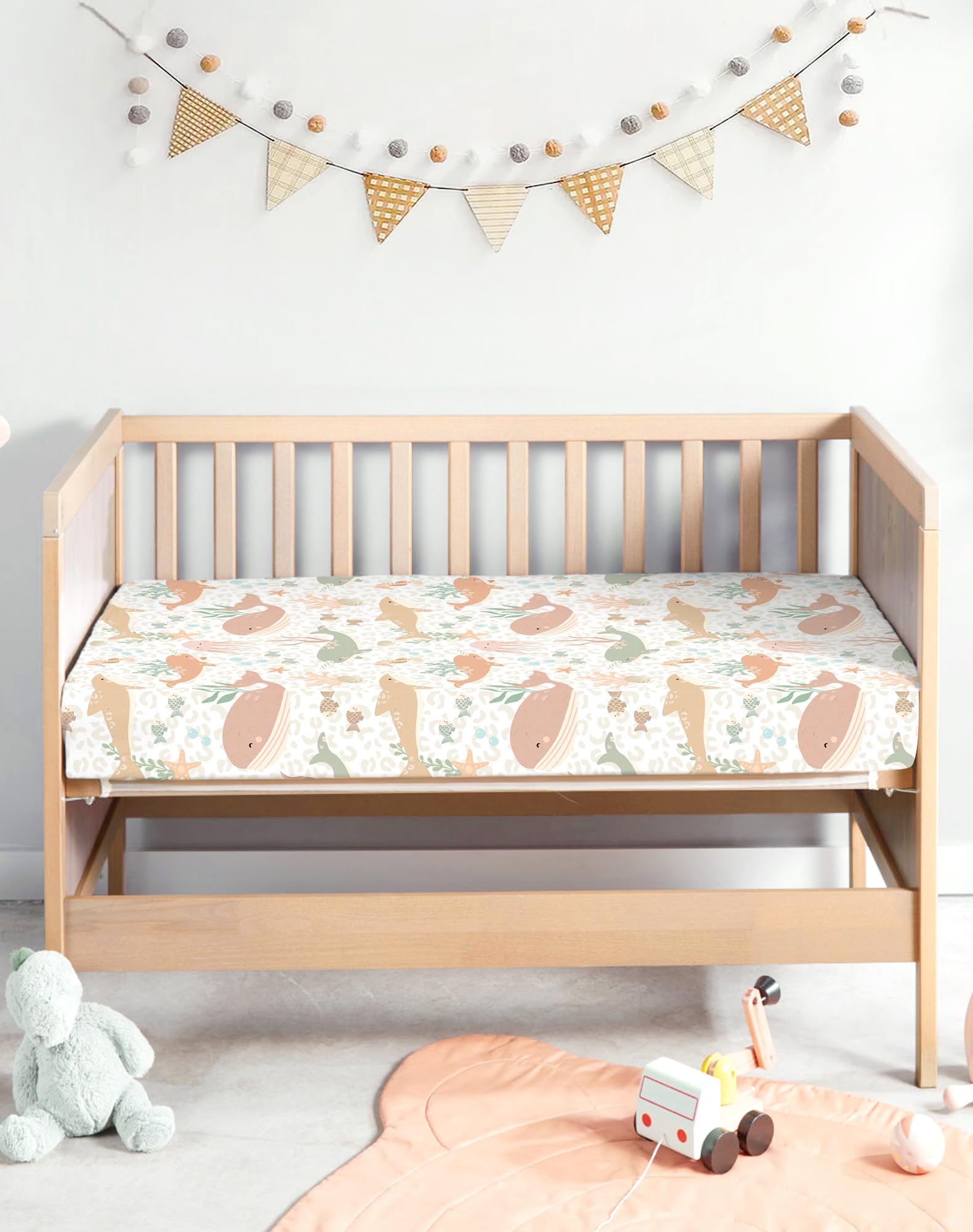 Woodiville Aqua Wonders space pattern sheet supports calm, cozy sleep.