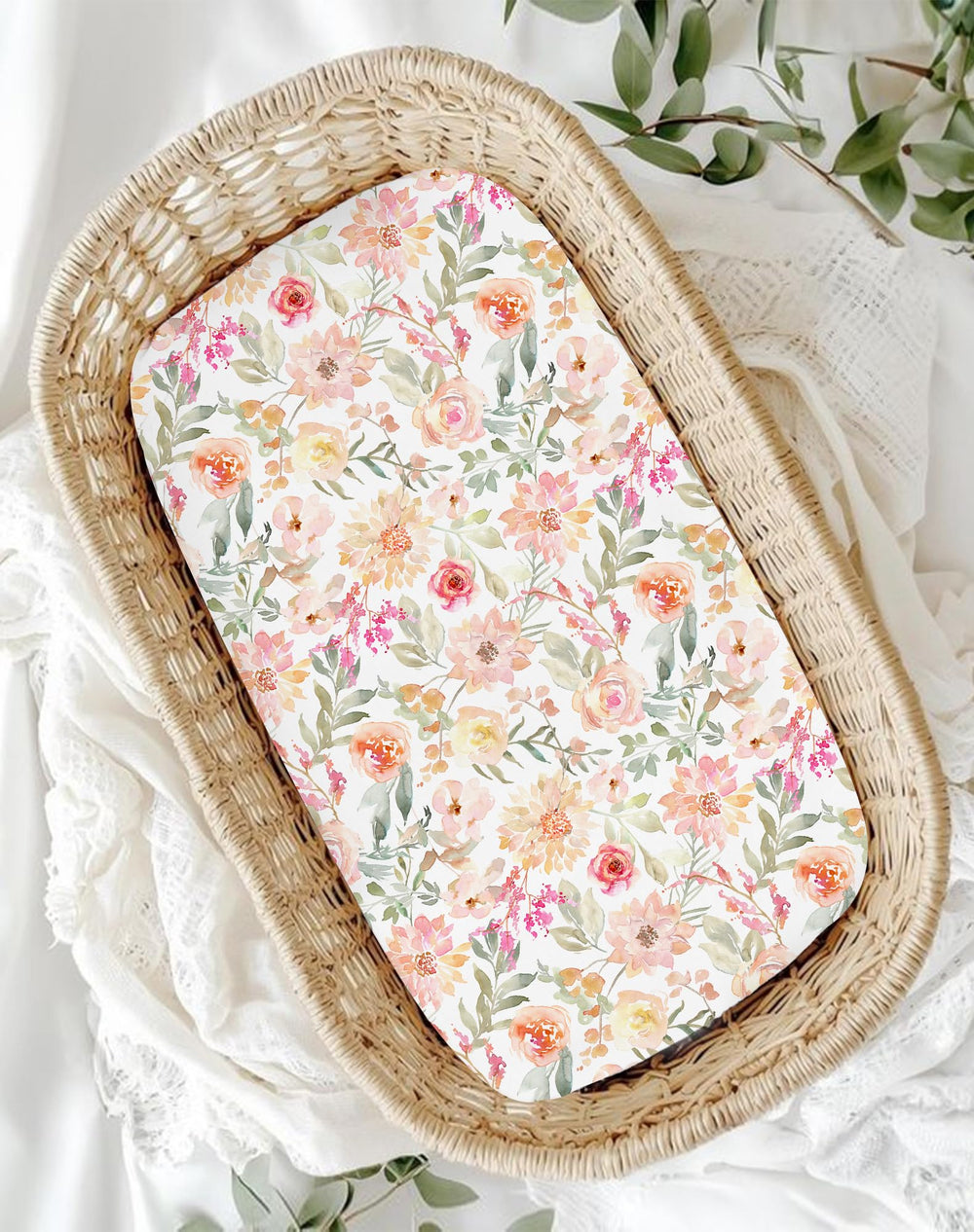 Neutral blush bunny color details on Woodiville bassinet sheets for versatile decor
