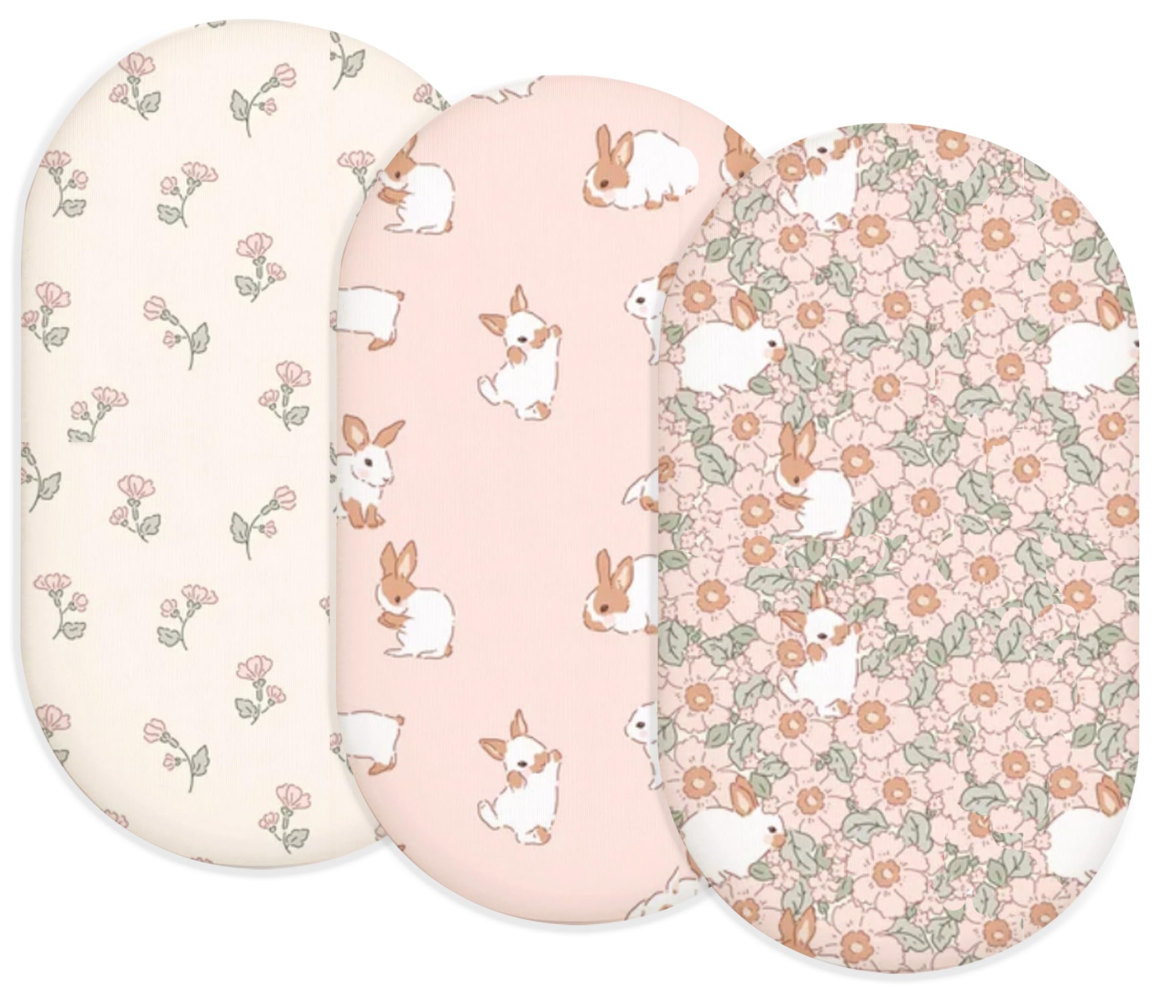 Woodiville Bassinet Sheets Blush Bunny two-pack on clean bed for newborn comfort
