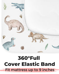 Woodiville Dino Pals crib sheet on mattress highlights breathable jersey knit.