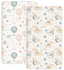 Woodiville Dreamy Swans crib sheets closeup elastic band for secure nightly fit.