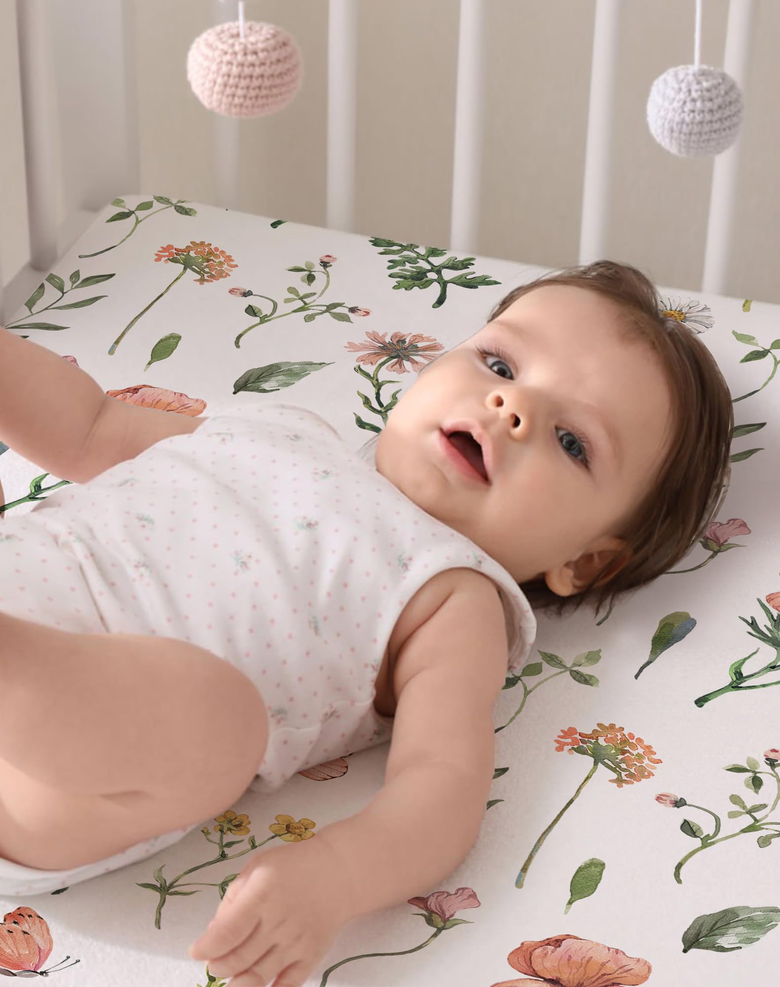 Woodiville durable easy-care mini-crib sheets; machine washable and fade-resistant for busy families.