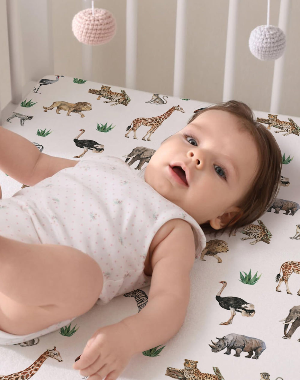 Woodiville gender-neutral design complements any nursery theme.