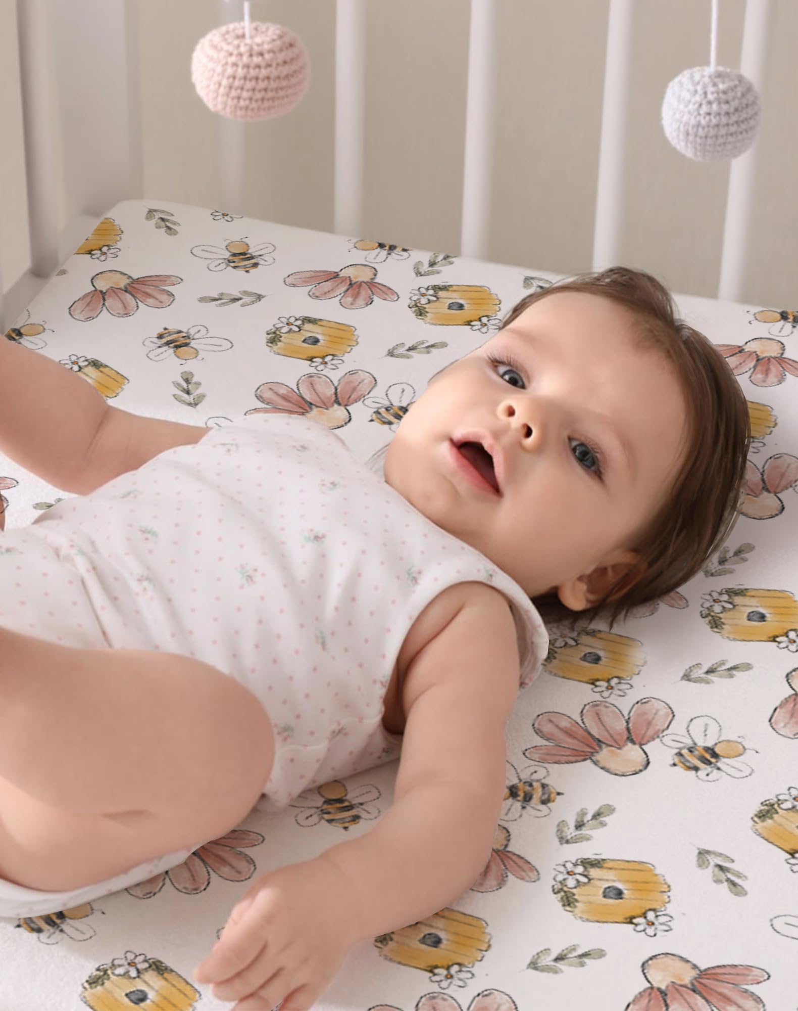 Woodiville sheets use all-around elastic for secure fit during playtime and naptime.