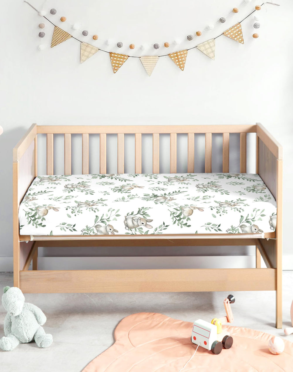 Woodiville 39x27 fit highlighted on mattress for a secure surface.