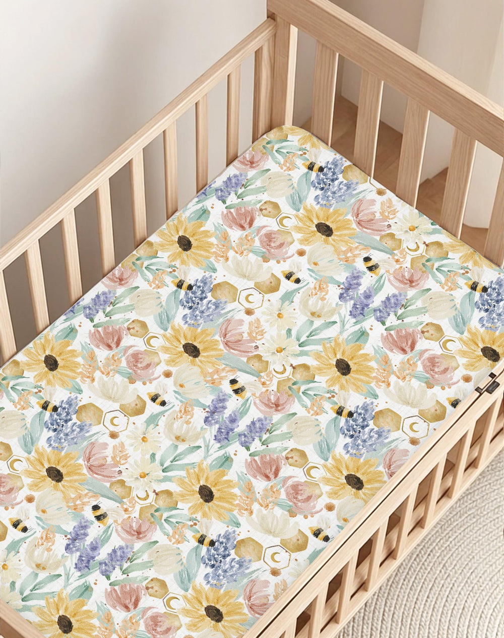 Woodiville Pack N Play sheet on a flat, breathable surface