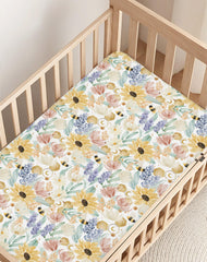 Woodiville Pack N Play sheet on a flat, breathable surface