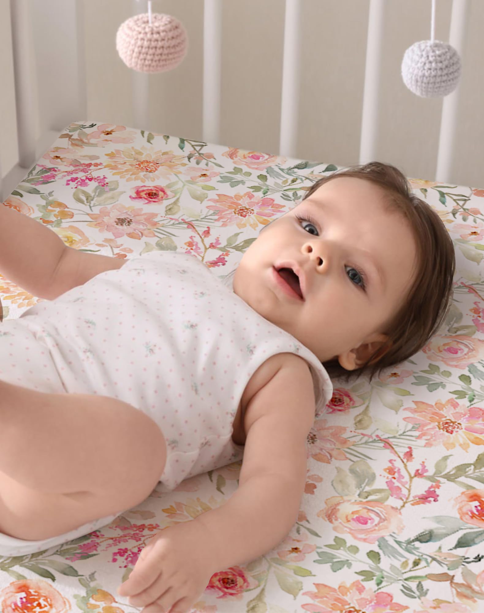 Woodiville two-pack sheets displayed as a stylish nursery gift