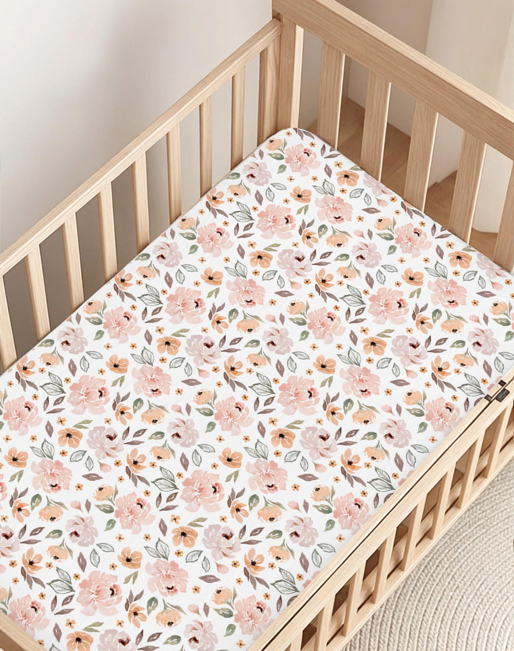Woodiville ocean-pattern sheets highlight calming blue tones ideal for soothing baby spaces.