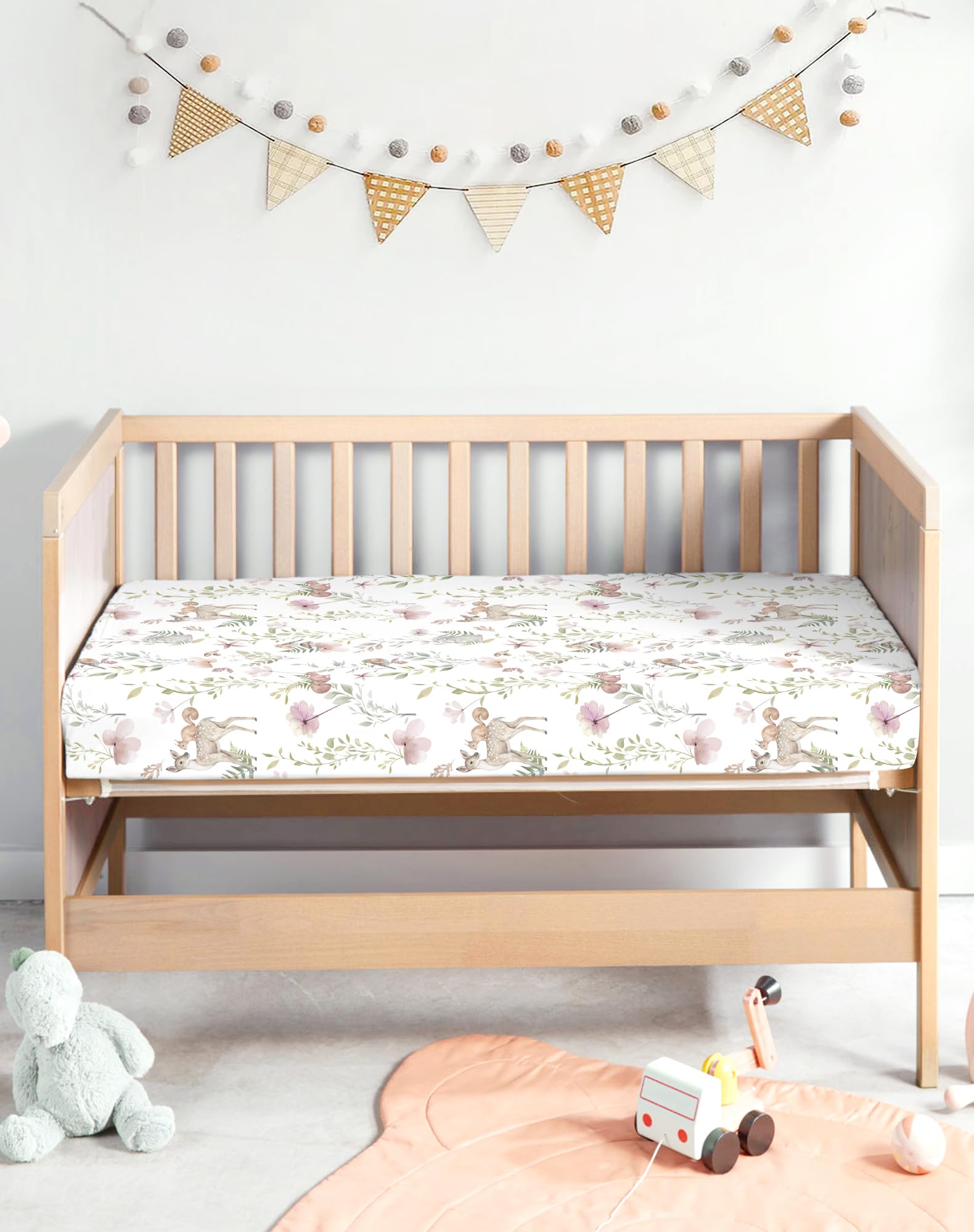 Woodiville pack-n-play sheets with secure elastic band for a snug, slip-free fit.