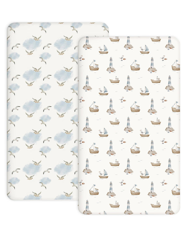 Woodiville Sailing Waves crib sheet 2-pack offers snug fit for baby's sleep surface.
