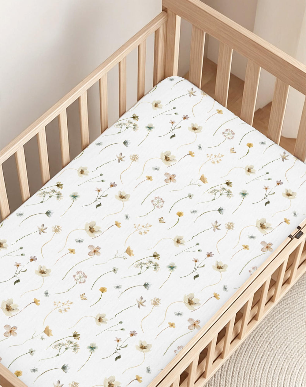 Woodiville stain-conceal mini-crib sheets; helps surfaces look cleaner between washes.